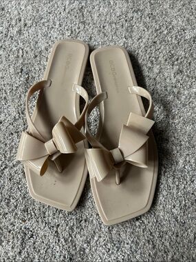 BCBGeneration Women's Nude Bow Toe-Post Sandals